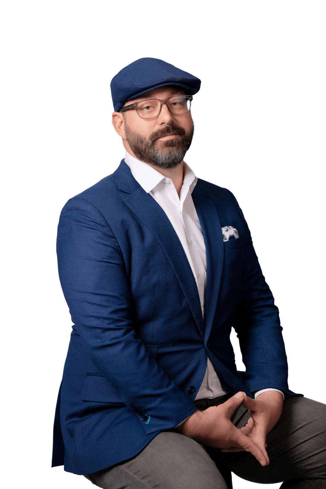 Paul Swaney in a tailored jacket and cap